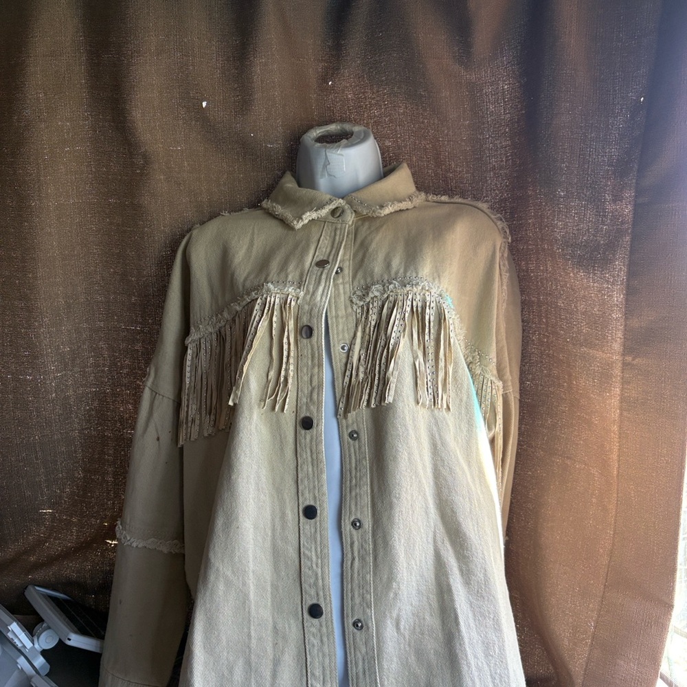 Fringe Trim Jean Jacket in Light Beige with fringe in front and back.